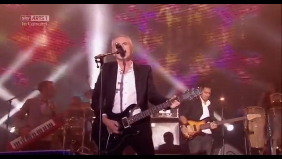 Pete thinks he's cool when he plays the keytar, seen here behind Nik Kershaw on Sky Arts in 2013.