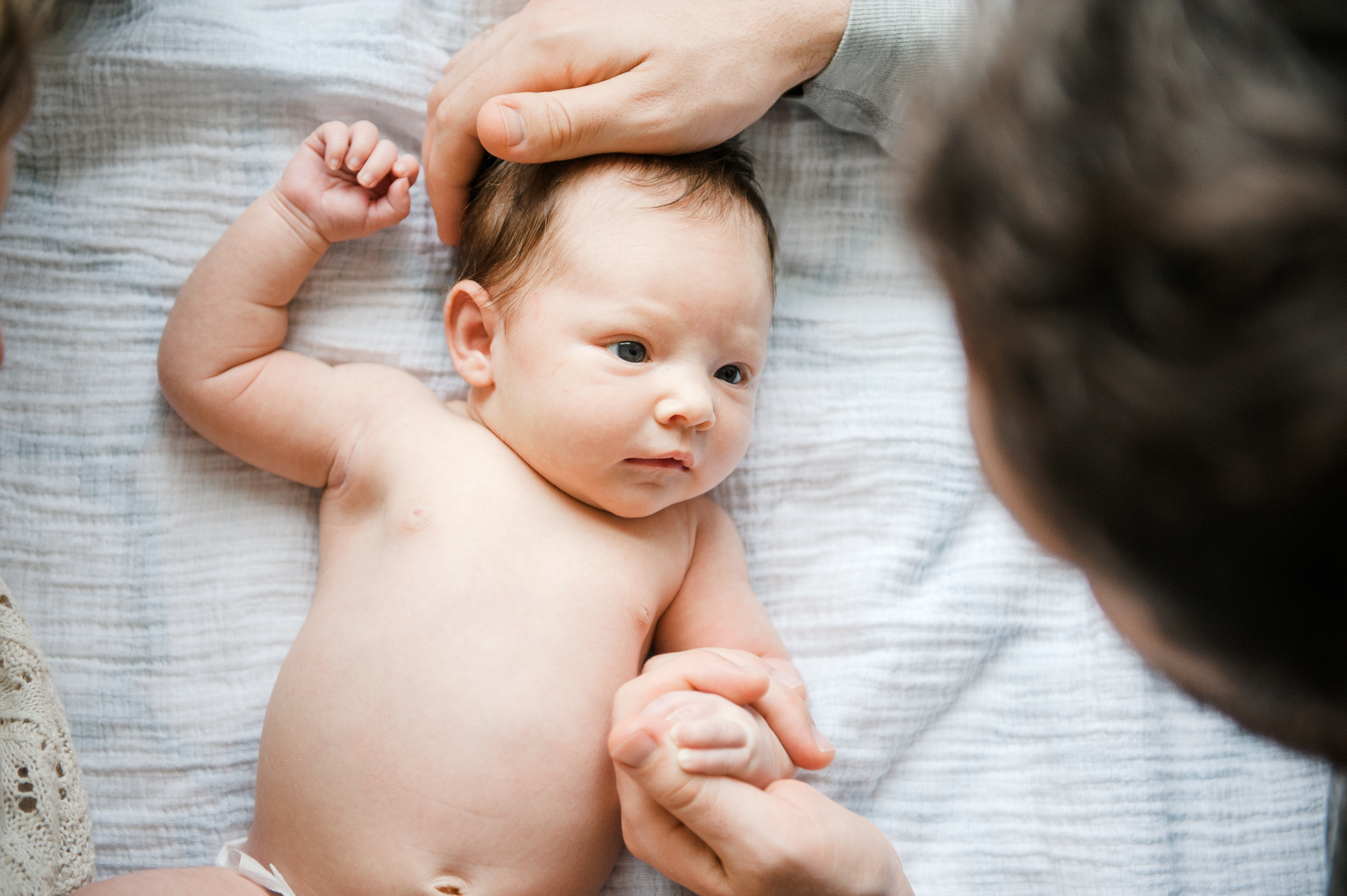 Lifestyle newborn photographer in Washington DC, Virginia. Sessions done in home.