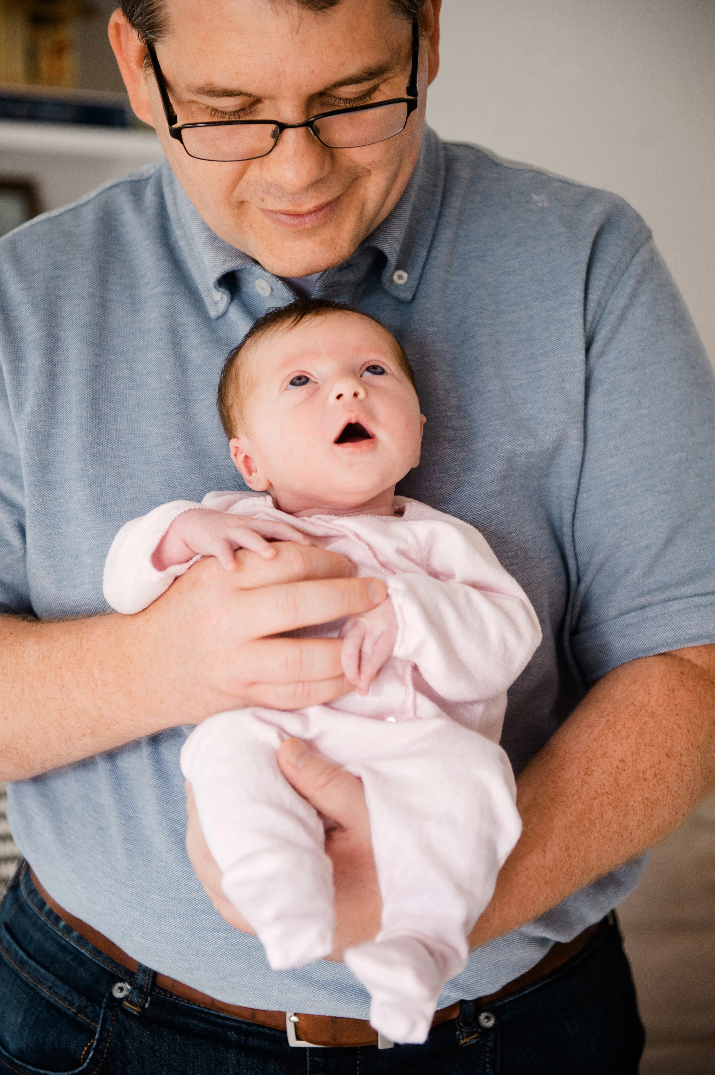 Lifestyle newborn photographer in Washington DC, Virginia. Sessions done in home.