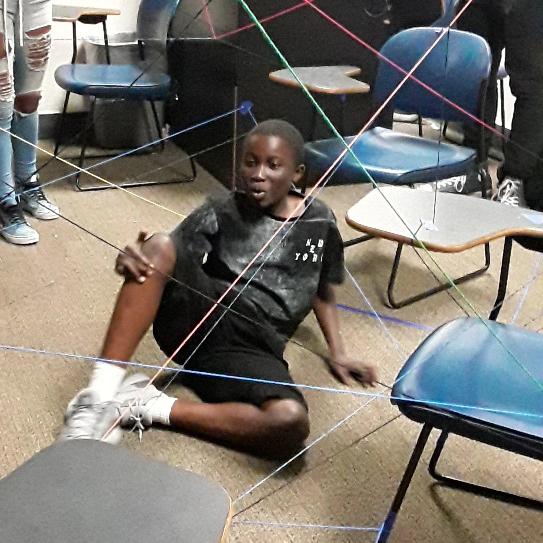 Amara doing a scavenger hunt, code-breaking activity.