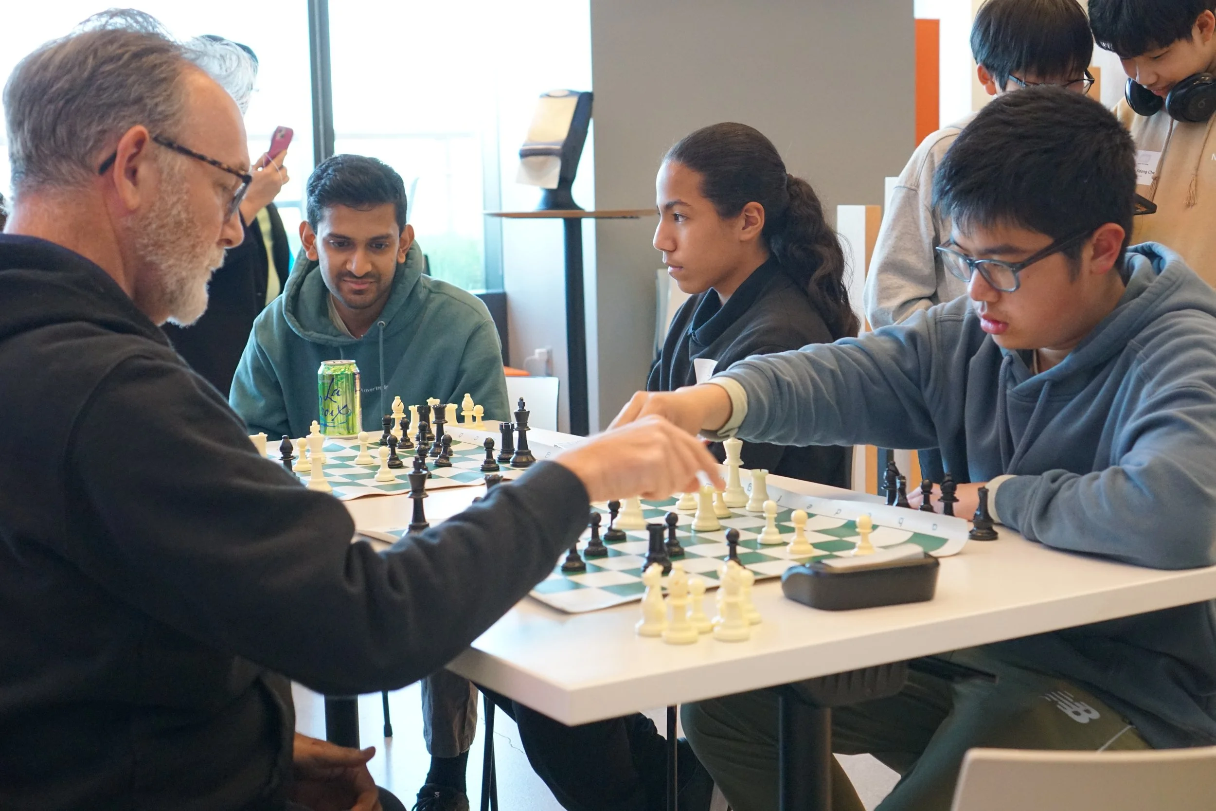  At our corporate partner Hudson River Trading’s Game Night in NYC, a student and HRT employee face off in chess.  