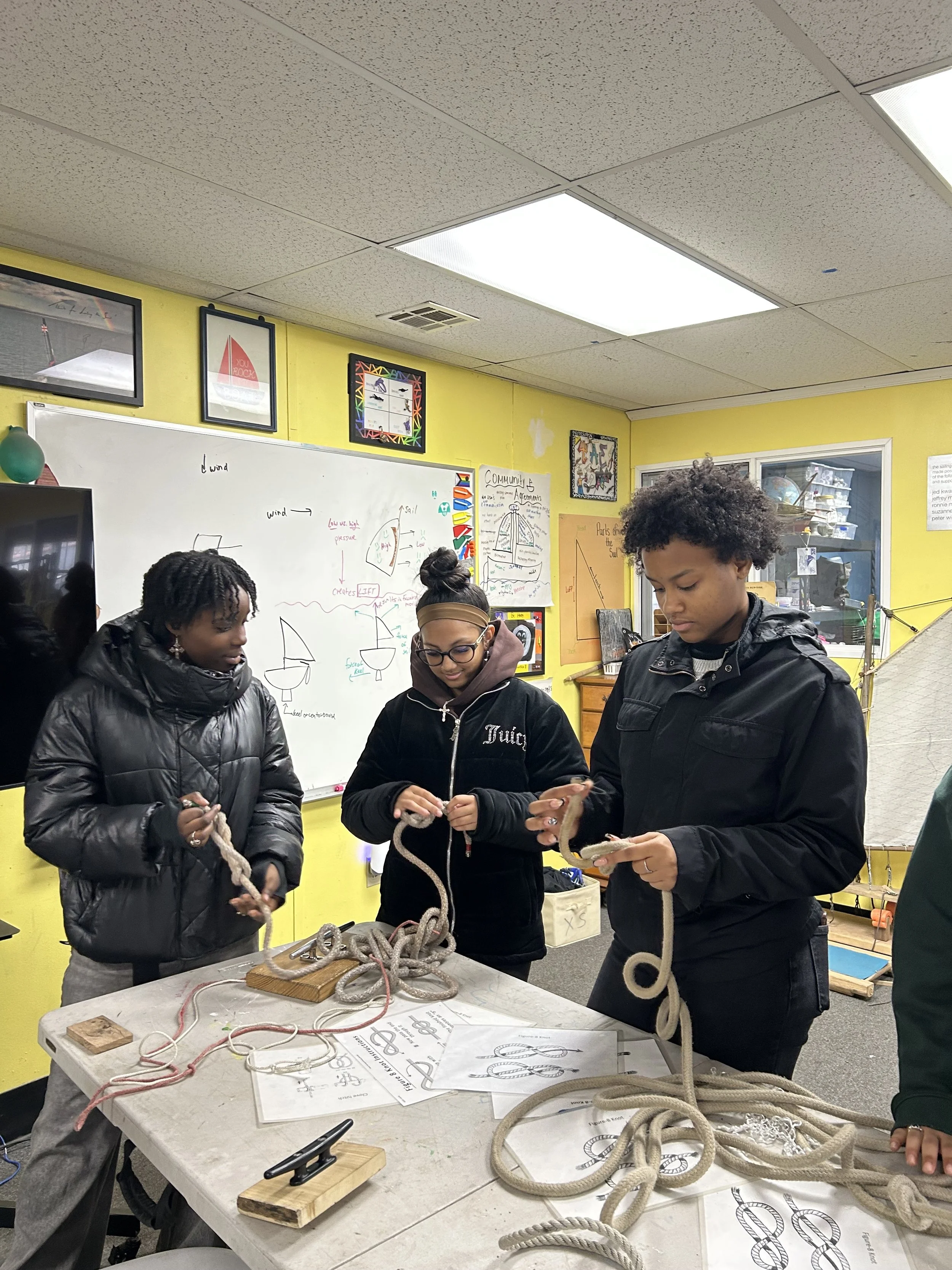  NYC students learn how to tie sailor’s knots during a field trip to nonprofit Rocking the Boat.  