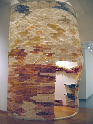 Hunk and Dora, 2006, abaca, cotton, linen, wood monofilament, tyvek, buttons, sand, 14' tower, 6' doorway, Columbia College