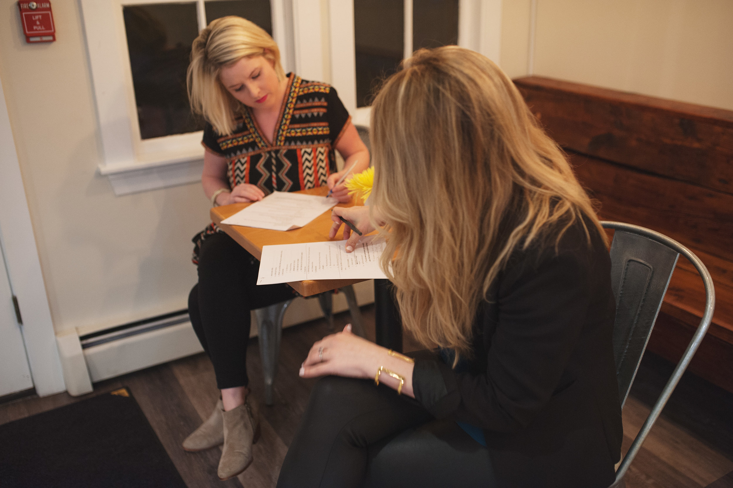 Last minute note writing as we prepared for Bloom Live to start at Laney & Lu | Photo by Lauren Bodwell 