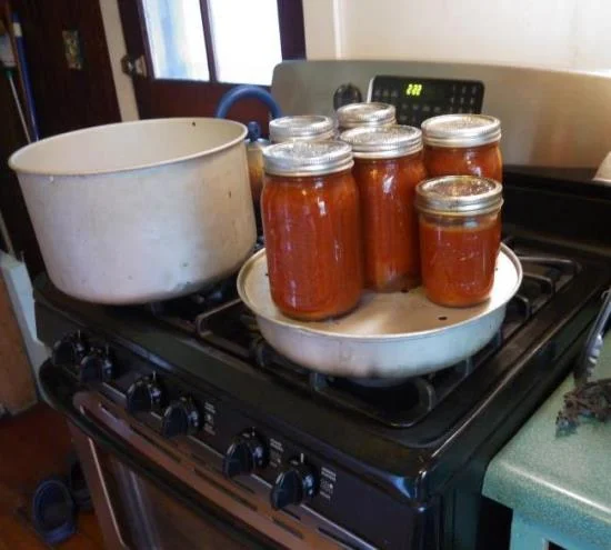 tomato puree in steam canner.jpg