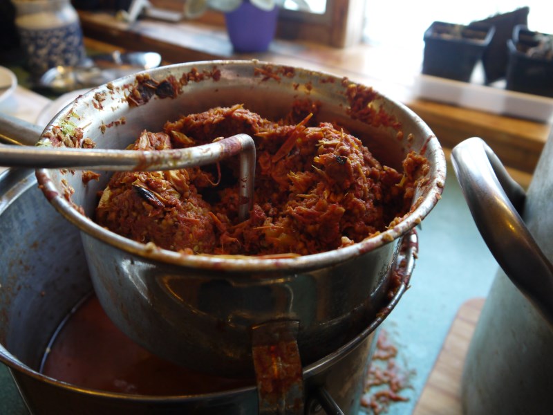 After the tomatoes have cooked down, strain out the seeds and skin.