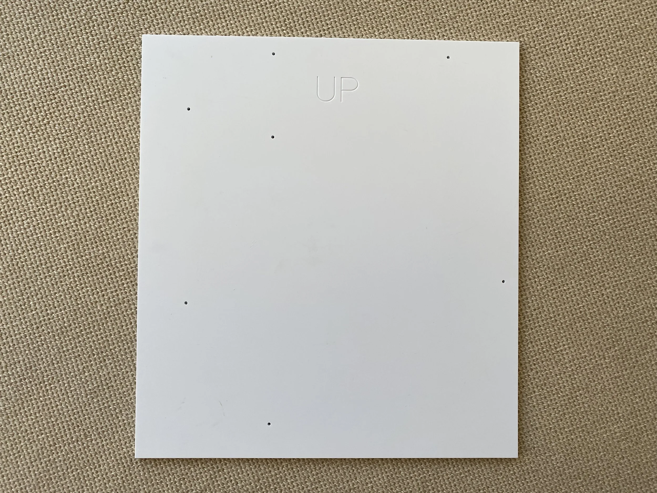  Template for leveling and drilling pilot holes into siding on house 