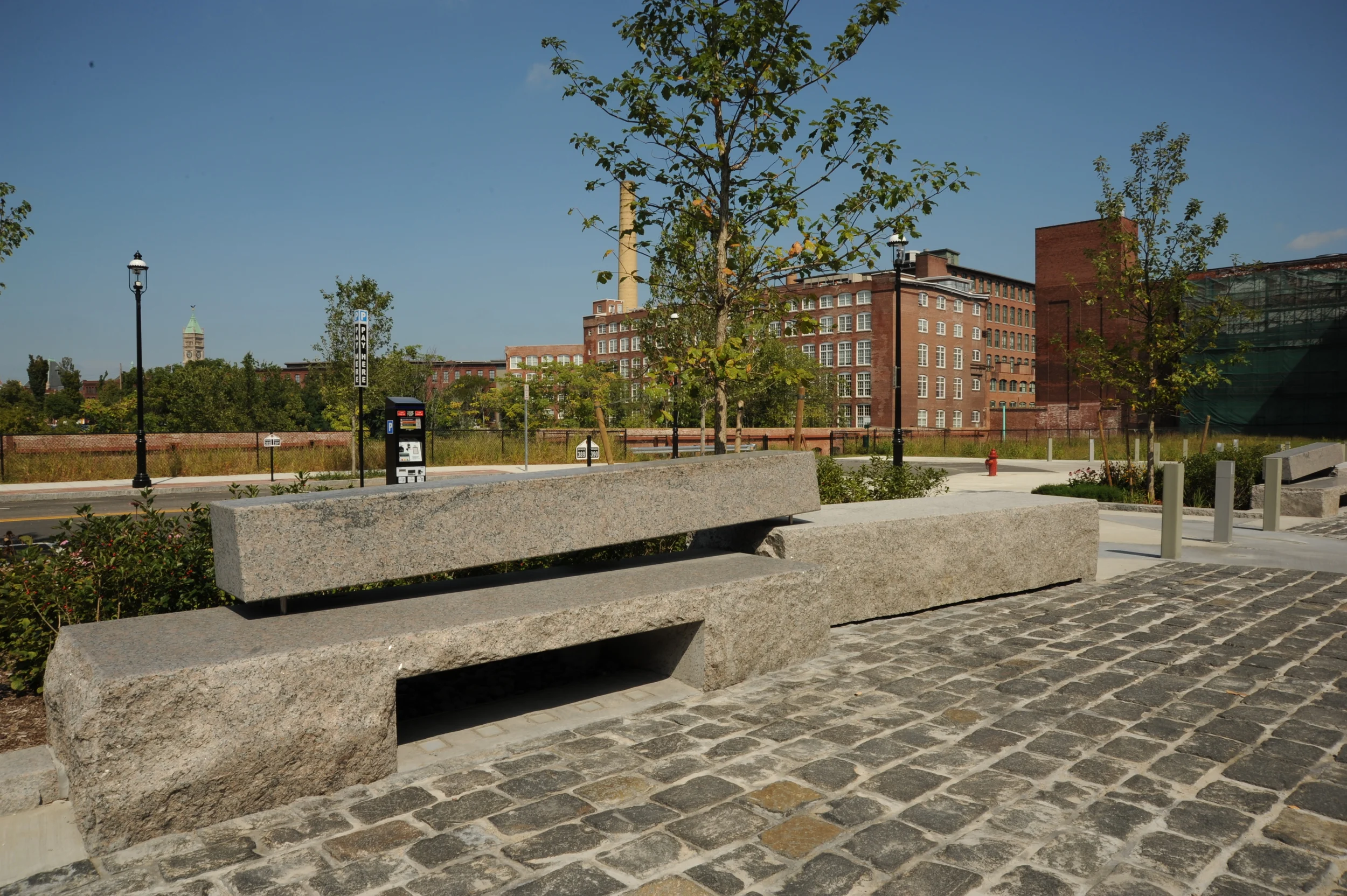 Appleton Mill, Lowell, MA.  Stacked seatwall bordering a rain garden (project completed while at CWDG)