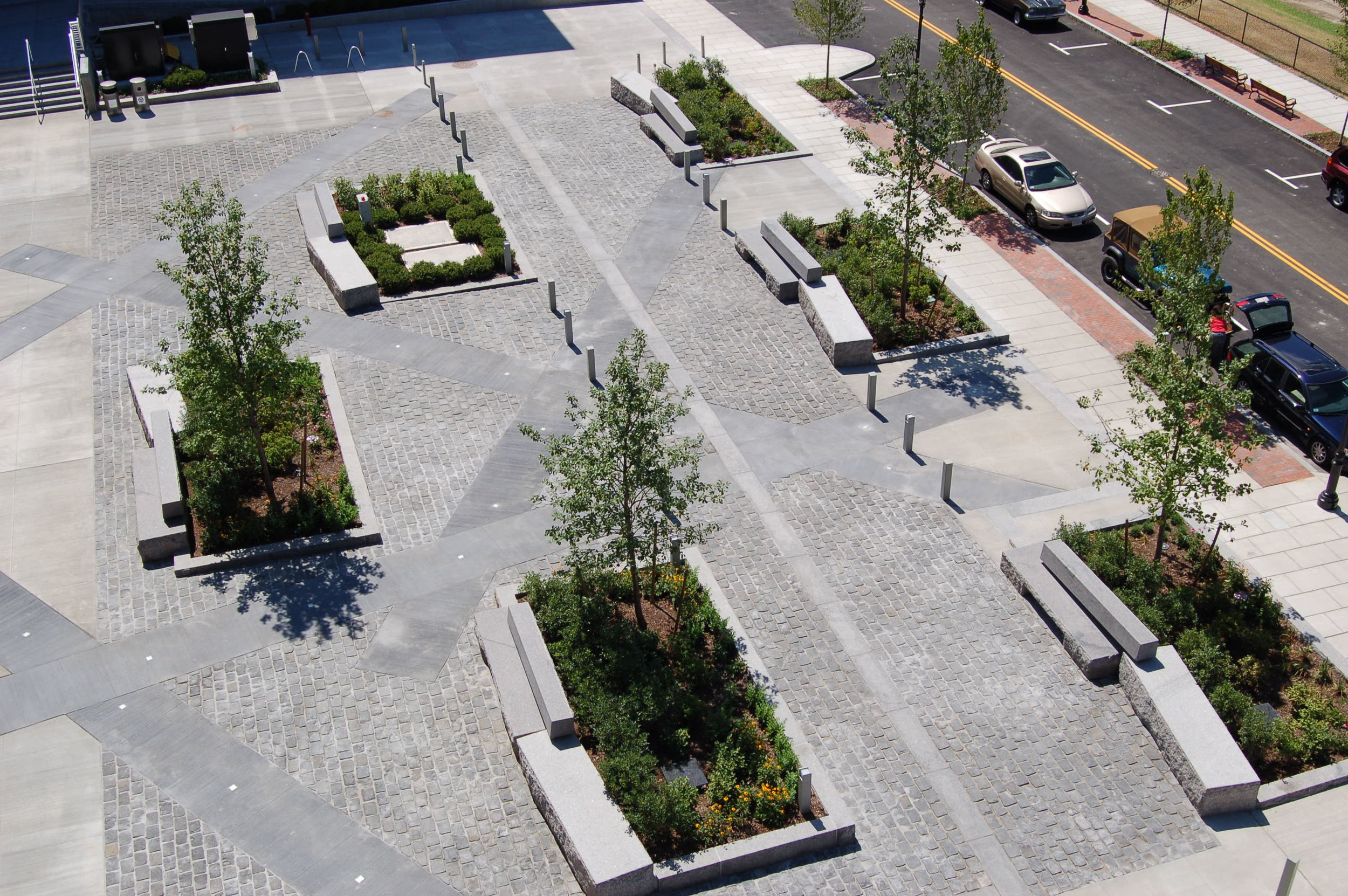 Appleton Mill, Lowell, MA. Artist housing courtyard with rain gardens and "goat path" lighted paths (project completed at CWDG)