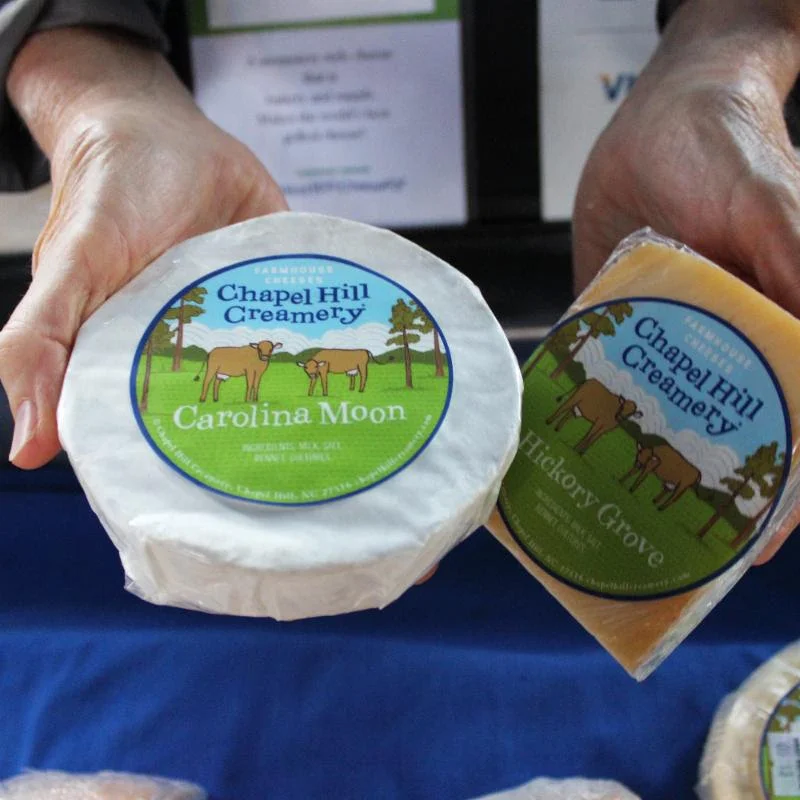 Flo holding cheeses.jpg