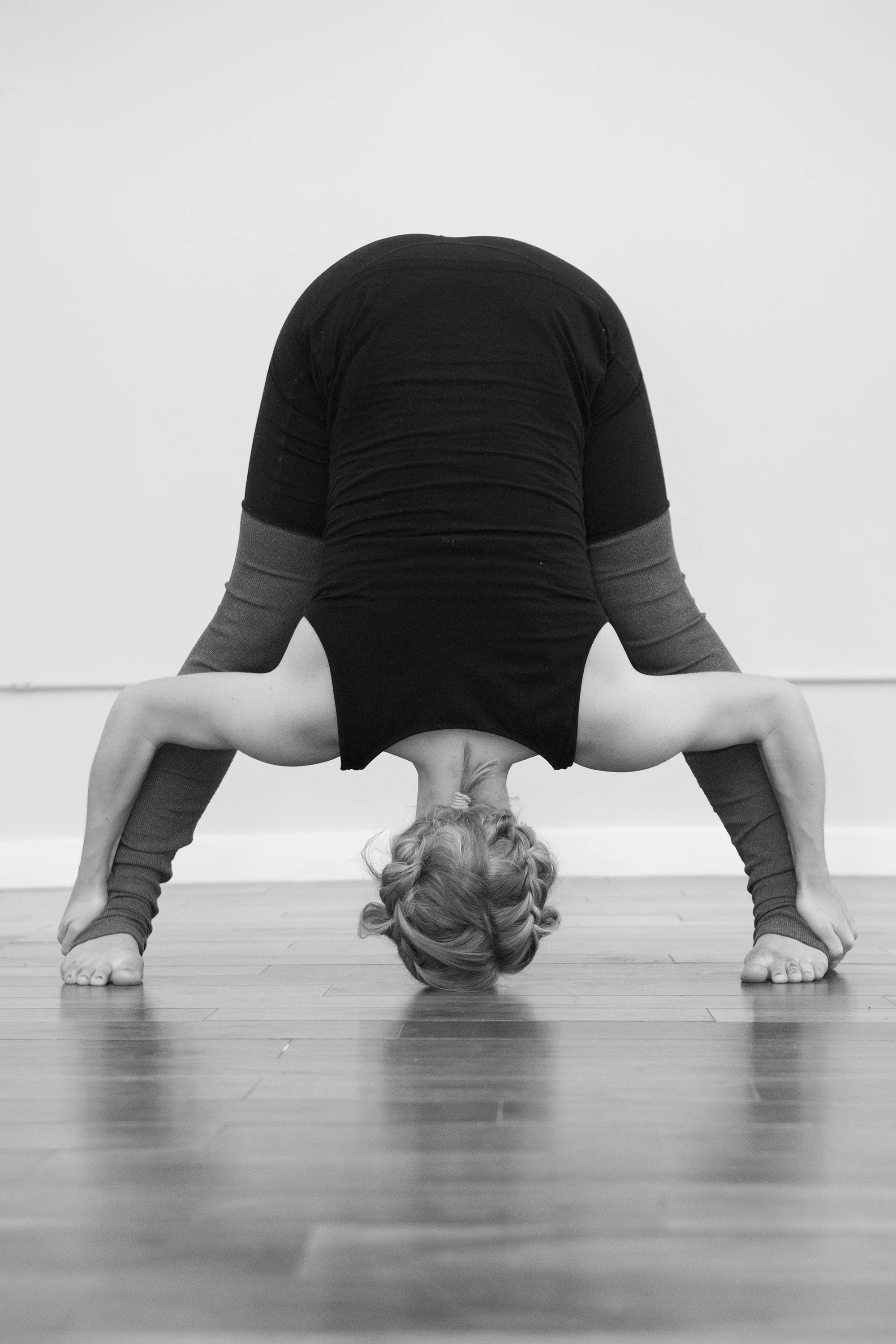 8. Standing Separate Leg Stretching