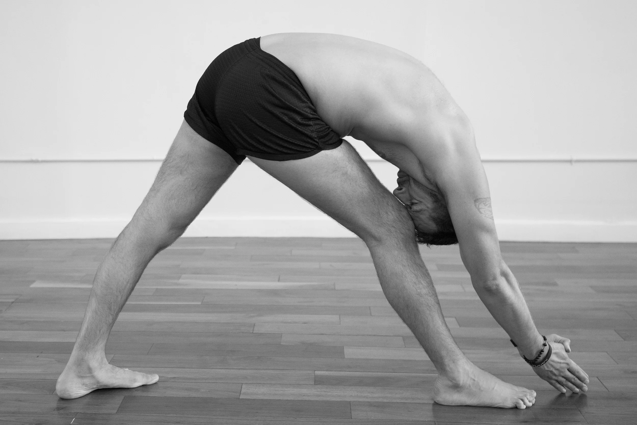 10. Standing Separate Leg Forehead to Knee