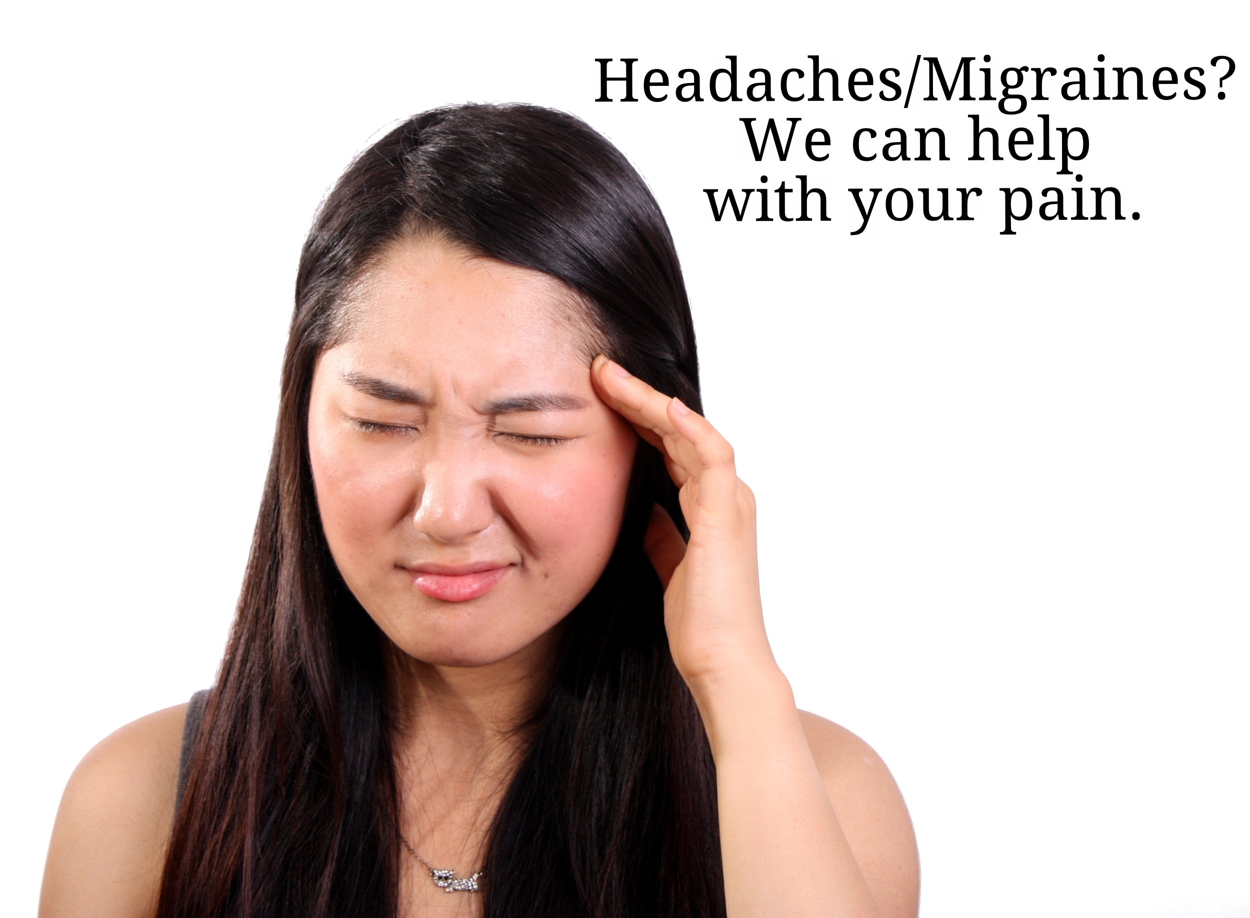 Headaches/migraines? We can help with your pain (A woman rubs her temple).