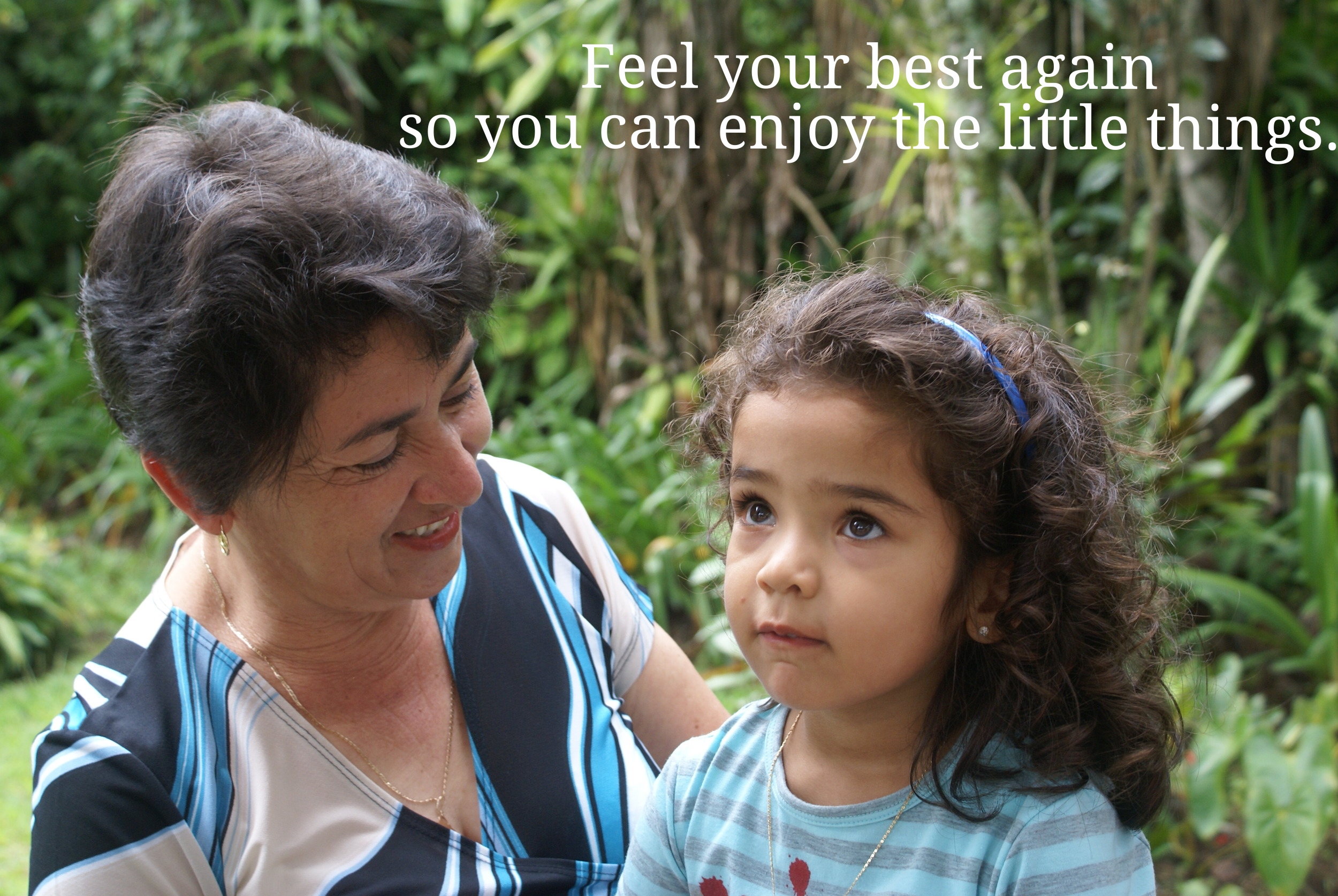 Feel your best again so you can enjoy the little things (Grandmother holds granddaughter).