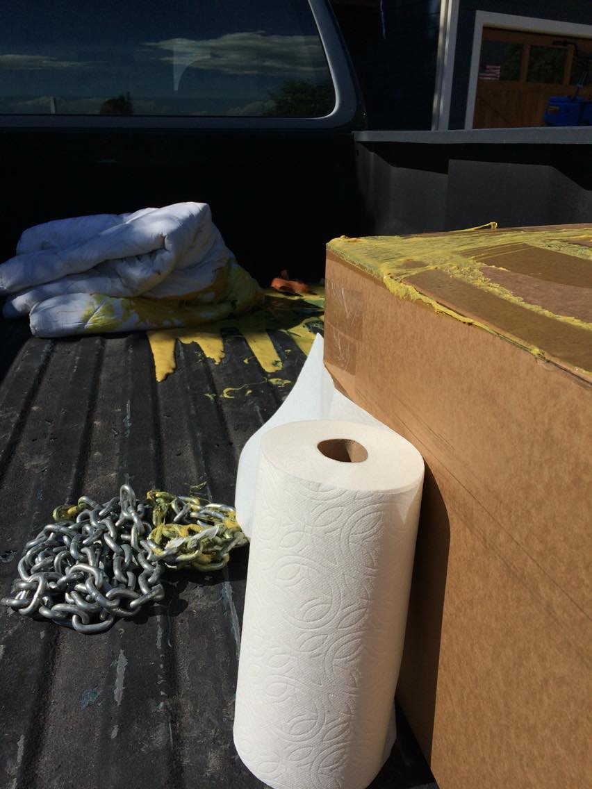 The adhesive managed to get on three tie-downs, a mattress pad, a chain, and the laminate box.
