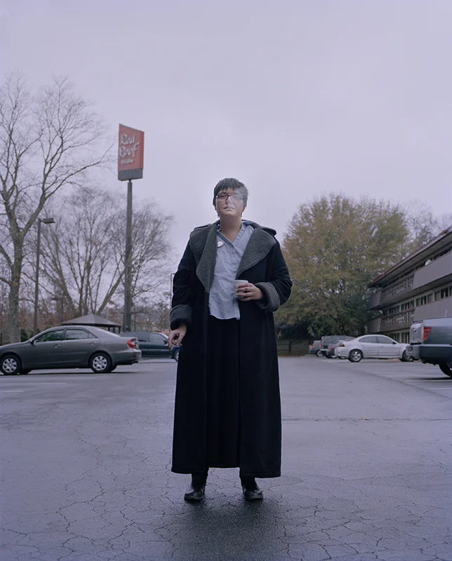 Li, hotel receptionist during her cigarette break Asheville, North Carolina