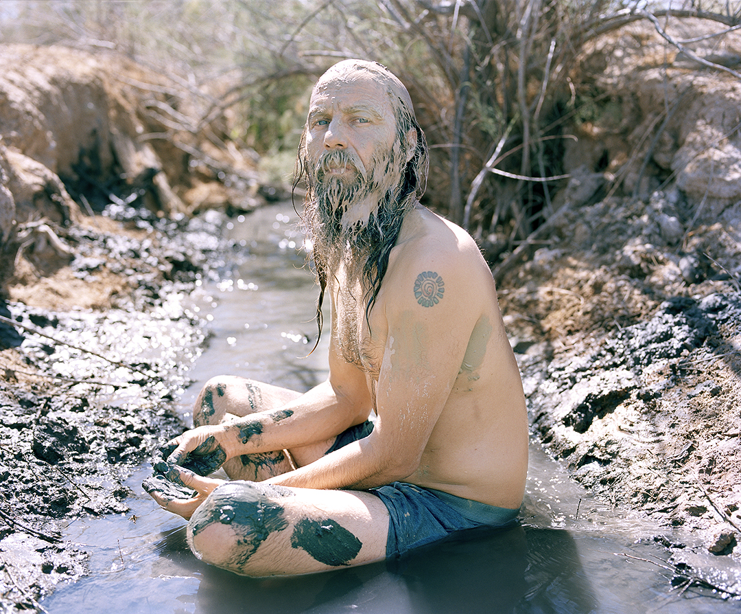  David sitting in the run off from the hot spring. 