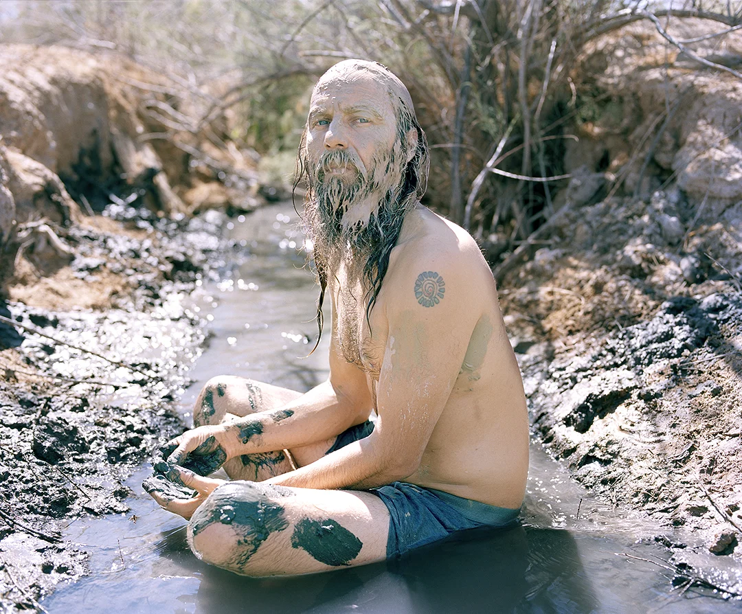 David sitting in the run off from the hot spring.