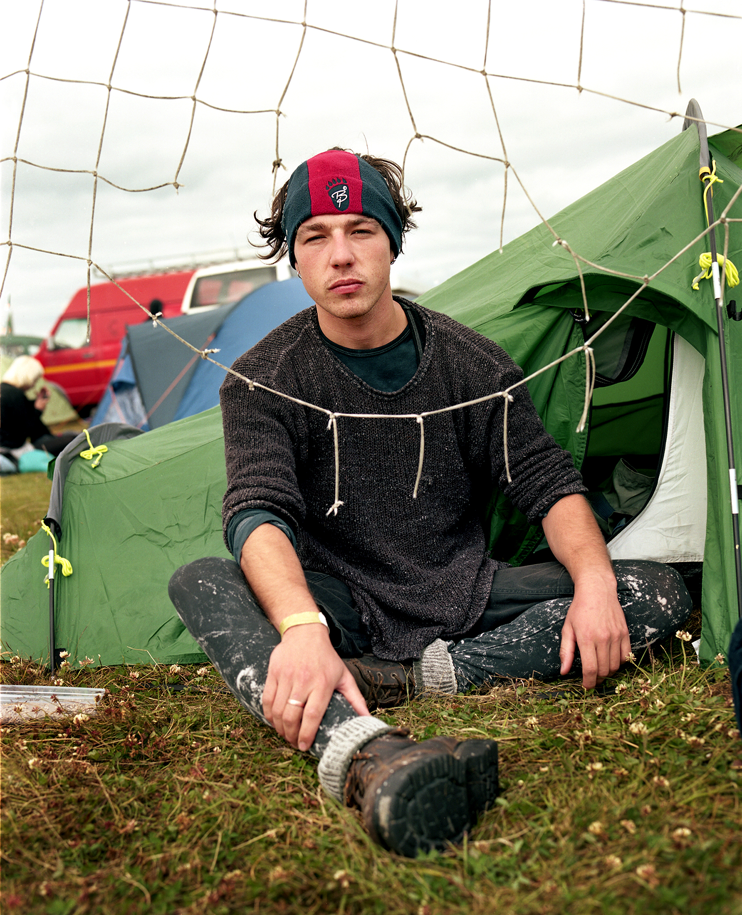 Nick in front of his tent at Norðanpaunk Nick is a noise performer and is often paying attention to the details of objects that come across his field of vision. He frequently stopped by Heima on his bike to drop off or pick up supplies. We once went dumpster diving at the local market. He stood in the dumpster looking at whatever he found to see what sound it would produce. 