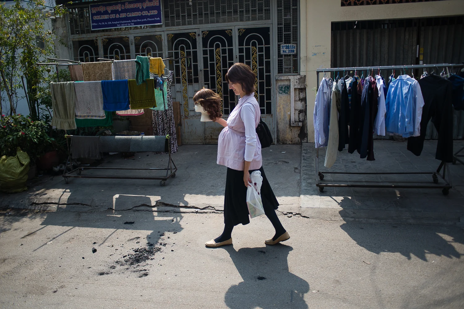 Mashie, like most Chabad Jewish women, wears a wig in public. Pictured here, she walks back to the Jewish Center after getting it styled. In Brooklyn, there are entire salons dedicated to wig styling. In Phnom Penh, Mashie had to do a lot of explaining.