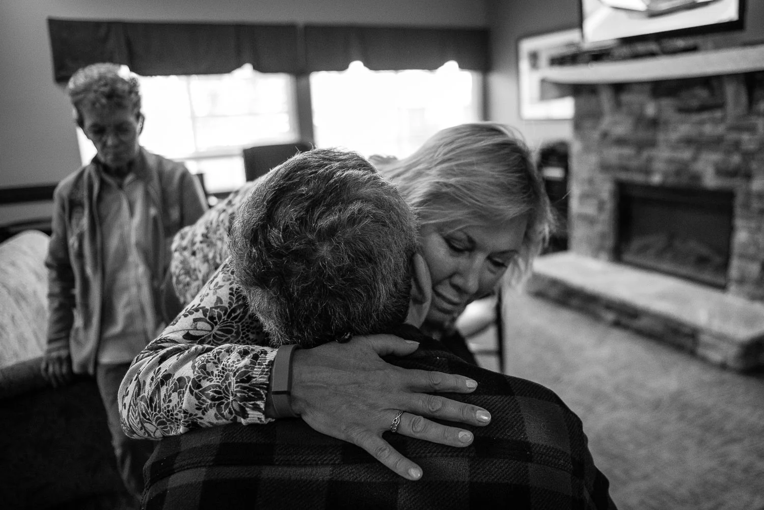 Julie visits Kenny almost every day, so she is often greeted by many of the other patients who live in the center. Leaving Kenny is often the hardest part. "The only blessing of this disease is the fact that it is harder on the caregiver than the person with the disease. He is going to forget that he was sad that I left".