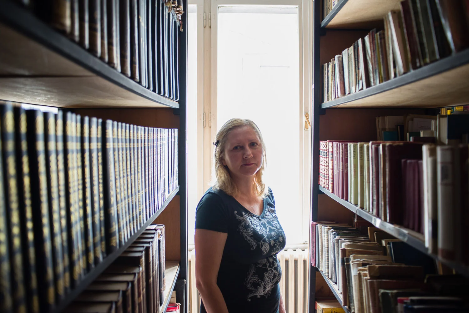 Gordana Girt is the manager of the small but neat library collection housed at the Jewish Center. All books are free to take out by anyone--although few outside the Jewish Community know the library exists.