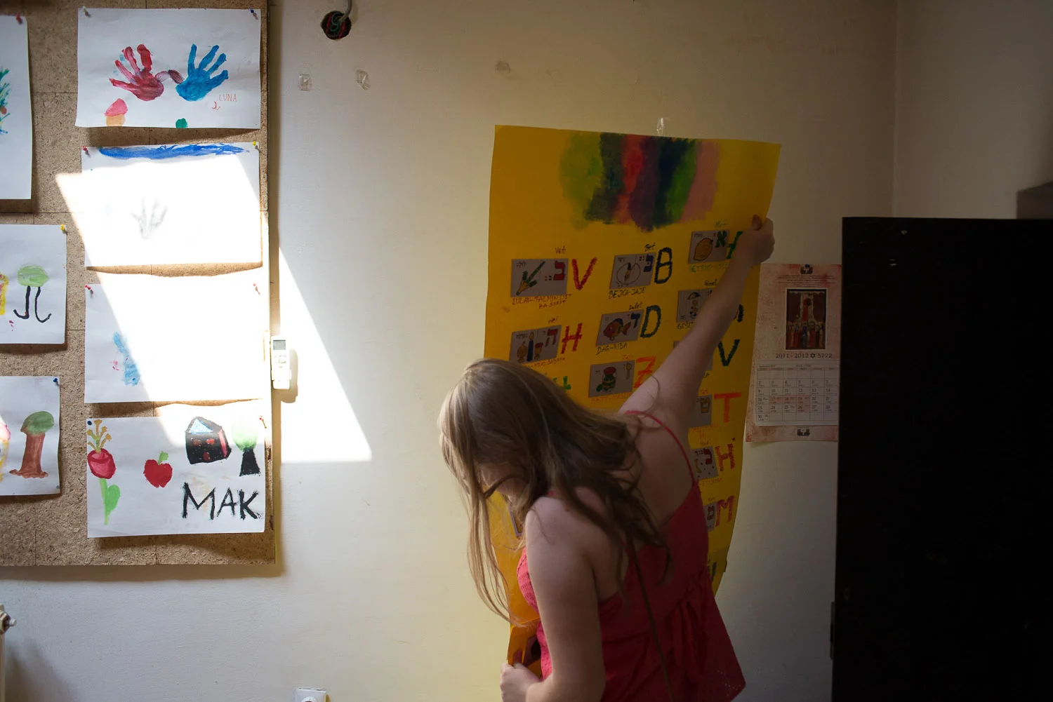 Andrea Andrle, one of the younger members of the community, helps out with the lessons for young children.