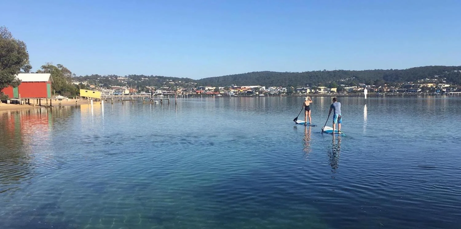 Couple-on-sups-Mitchies-Jetty.jpg