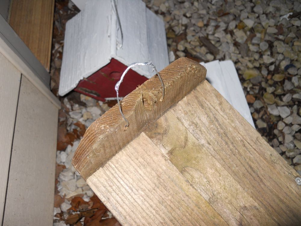 Rehabilitate well-used bird houses by adding new holes and wire to be able to rehang them.