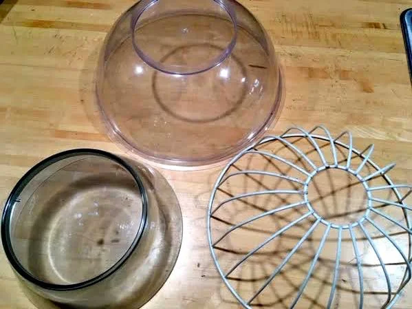 Three possible bird feeder covers to keep seed dry. (Photo by Charlotte Ekker Wiggins)