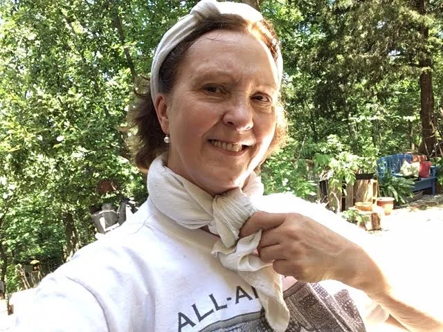 Muslin kitchen towels are excellent neck ties to catch summer perspiration. (Photo by Charlotte Ekker Wiggins)