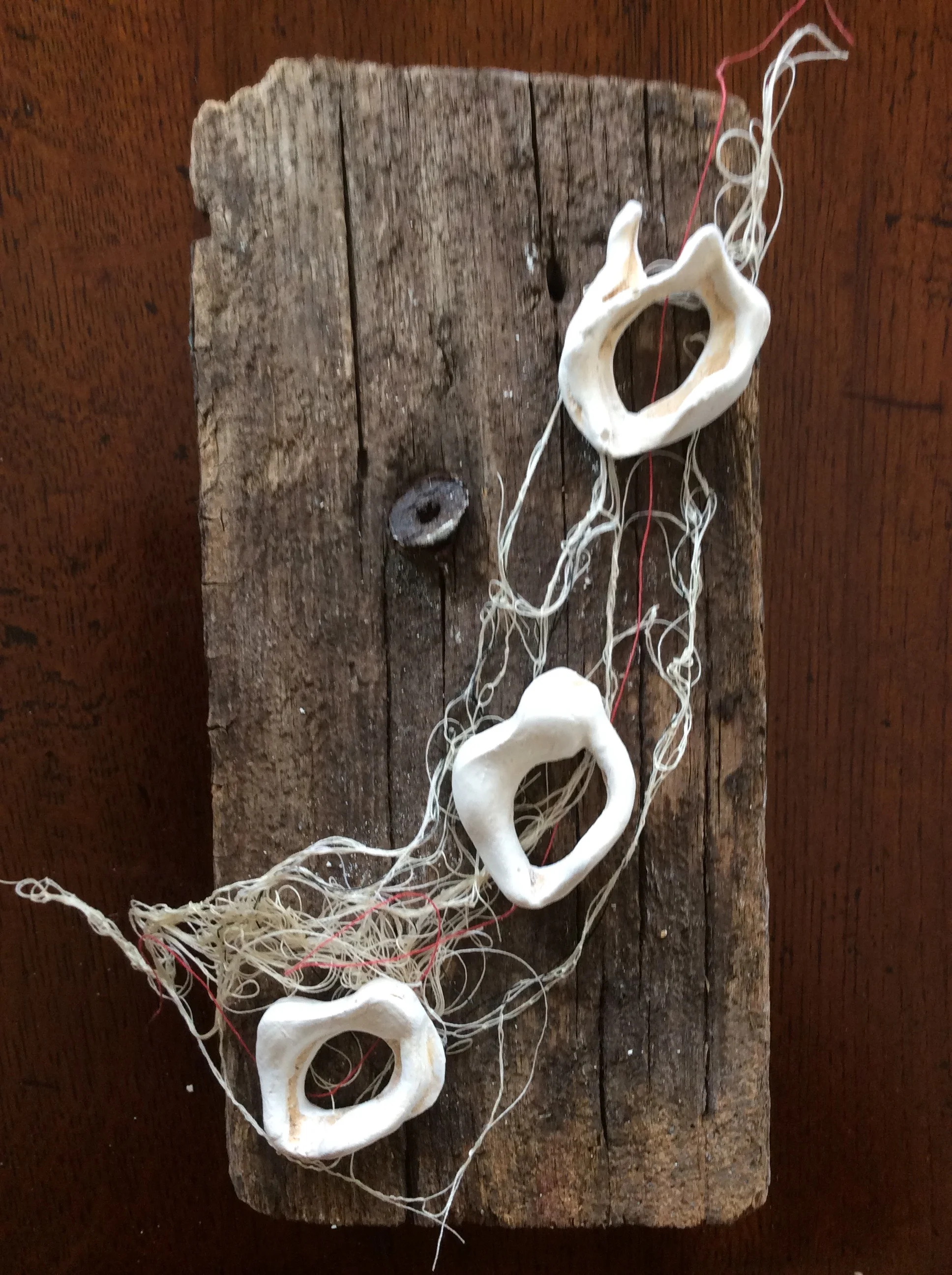 Juliet, work in progress (plaster, found wood, thread)