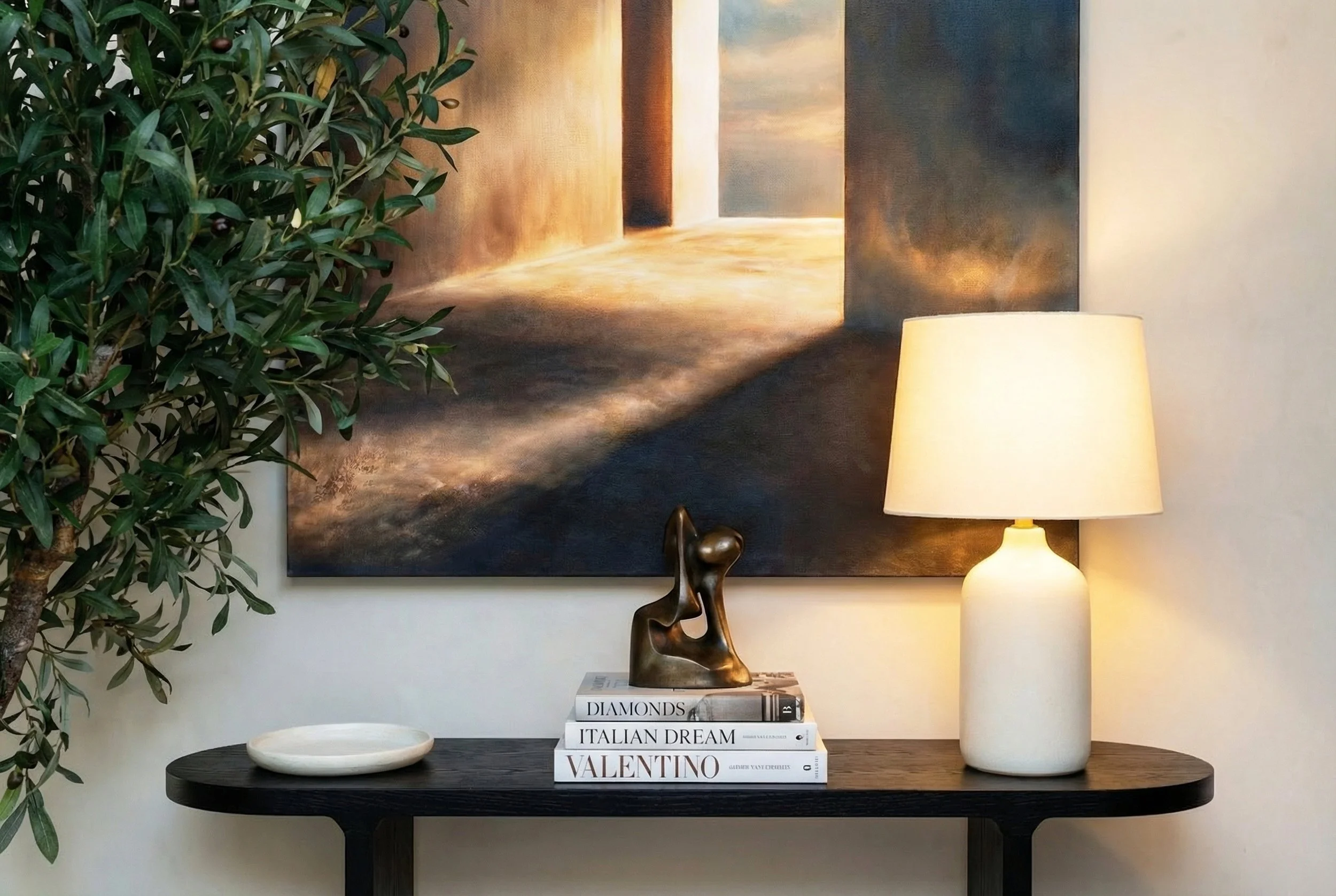 A close-up of a luxury staged entrance project in Southern California, consisting of high-end furniture, fixtures, details and styling
