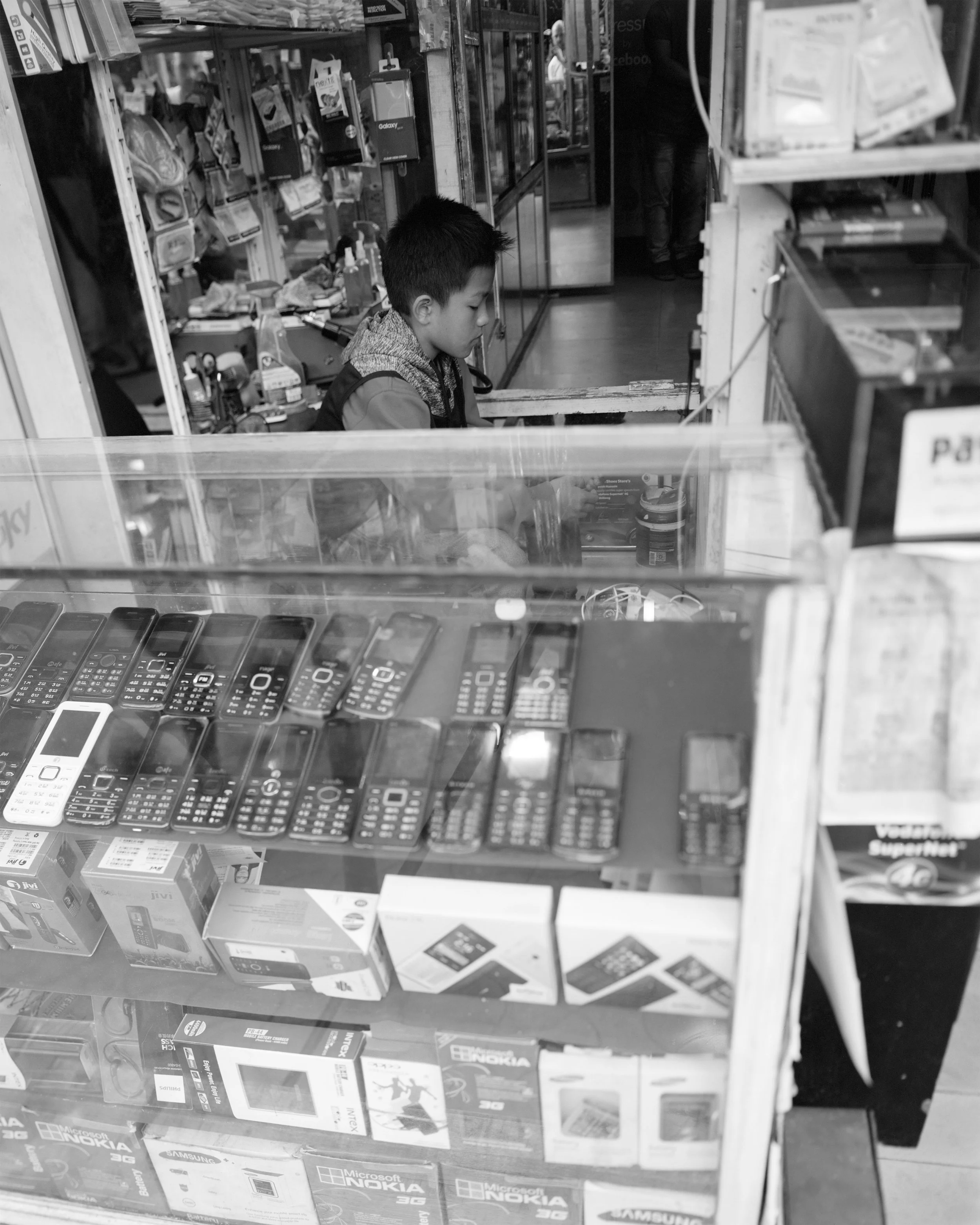 Cell Shop Boy, Shillong, India, 2017