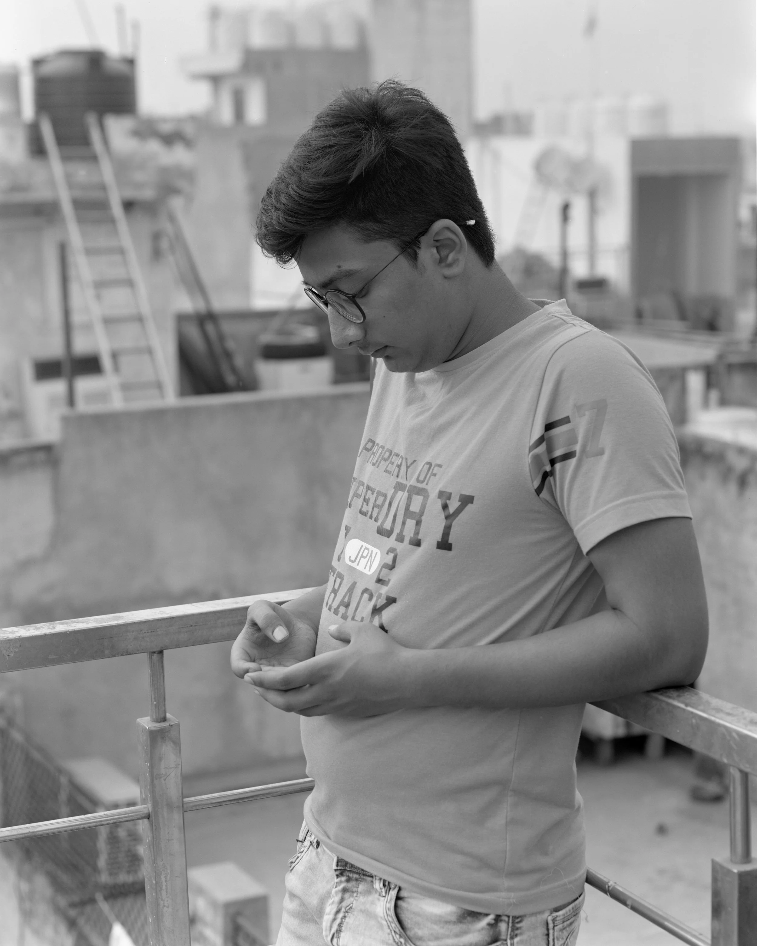 Rooftop Reader, Delhi, India, 2017