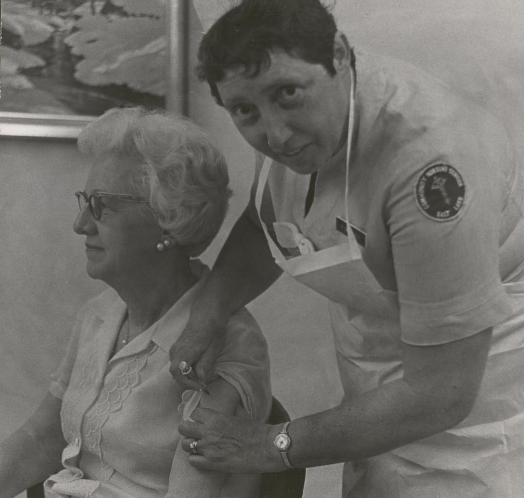 Nurse Giving Elderly Woman a Shot.jpg