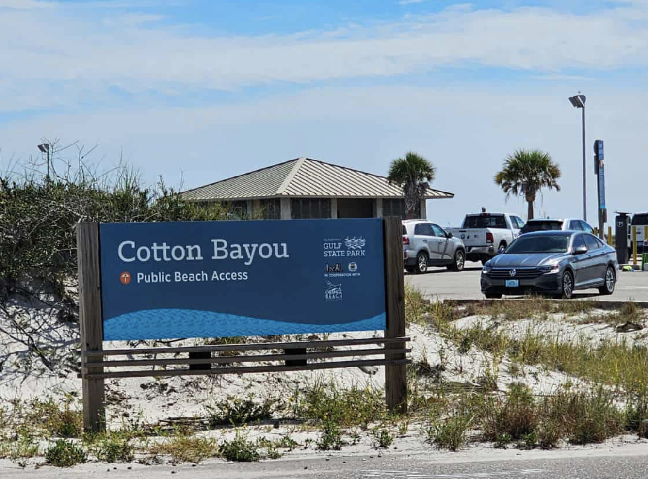 Map showing Cotton Bayou Public Beach Access along the coast, adjacent to Perdido Beach Boulevard, near Orange Beach, with nearby landmarks including Paradise Snow, Best Western Premier Tides, and Caribe Seaside Condos.