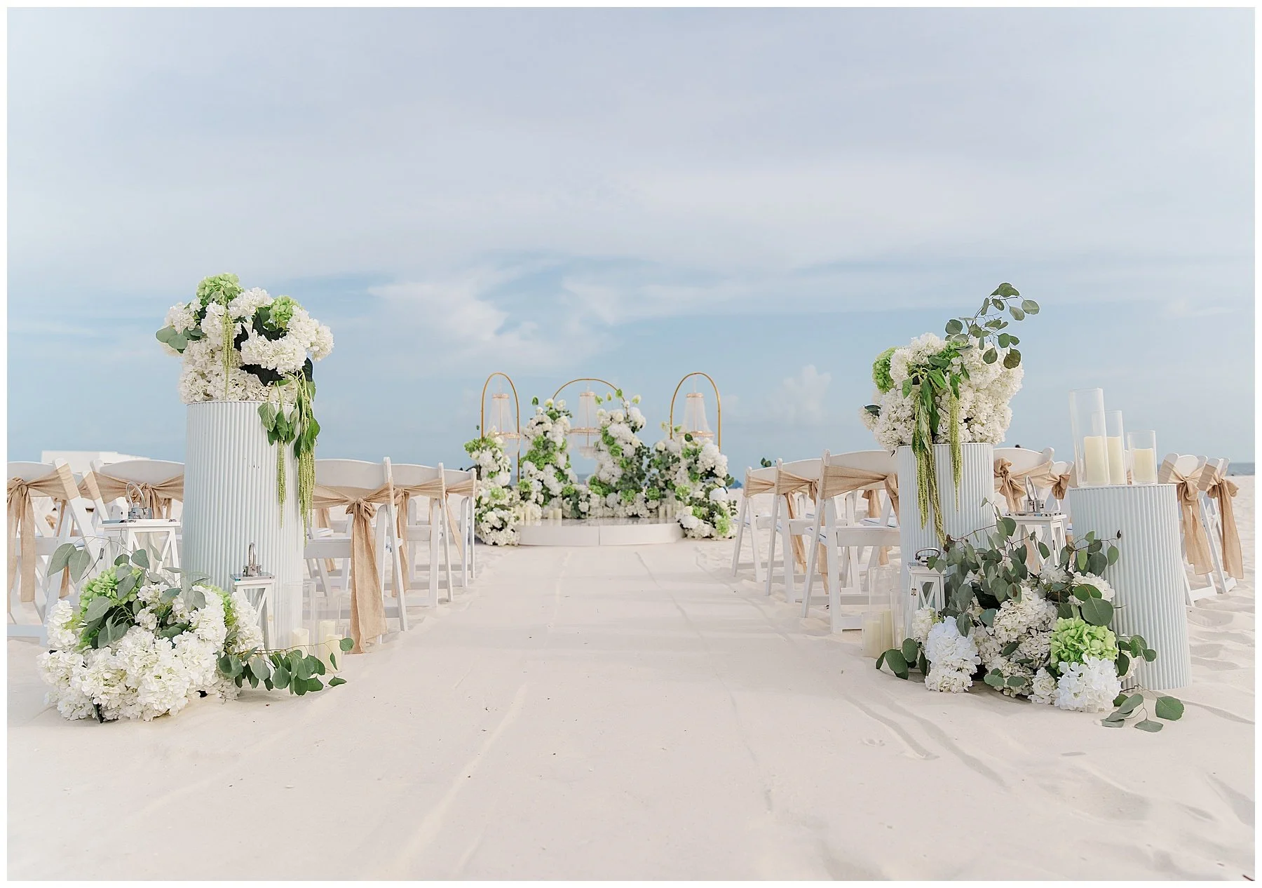 gulf-shores-wedding-white-green-ceremony-decor-gold-arches.jpg