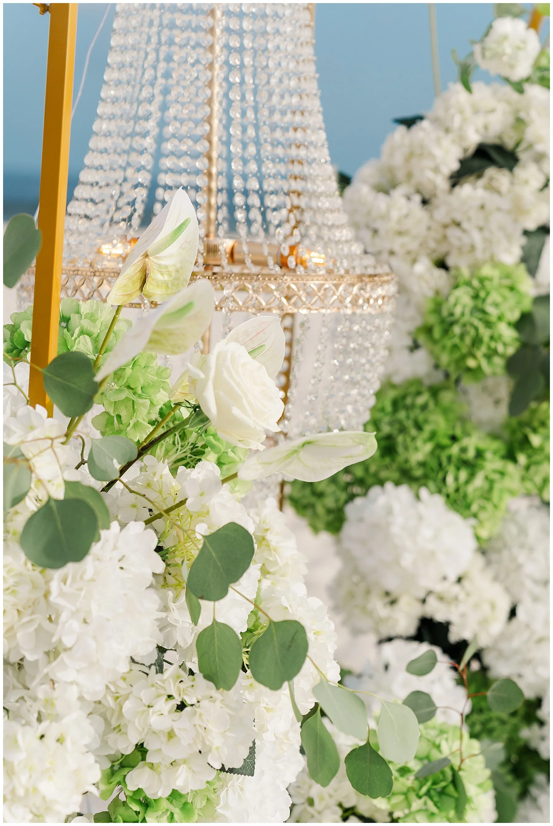 gulf-shores-wedding-crystal-chandelier-white-floral-detail.jpg