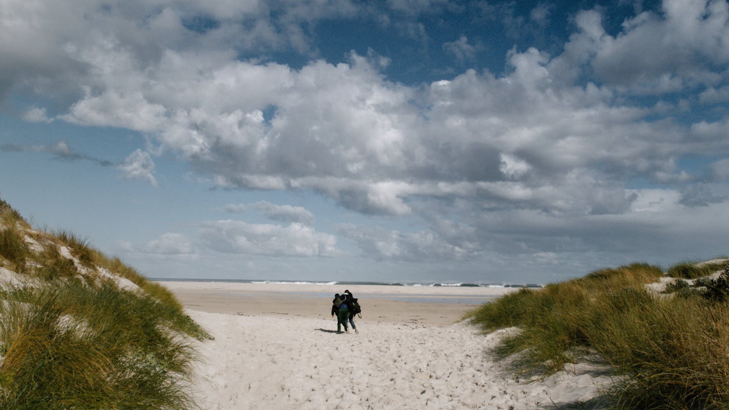 Gabe and Mikhail walking on to beach.jpg