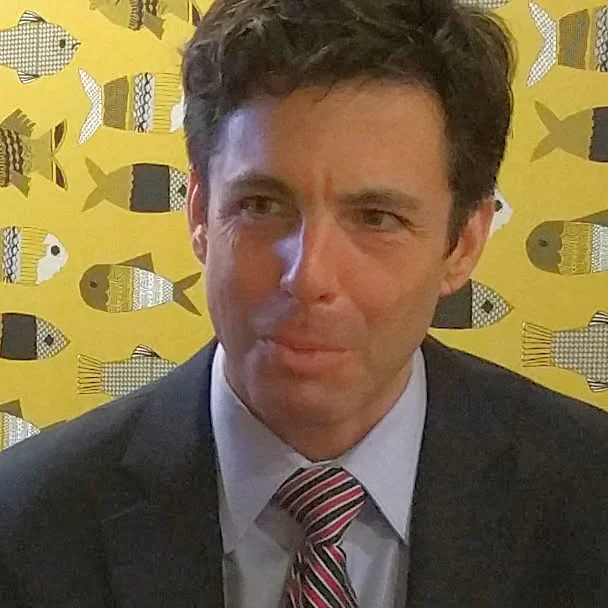 Image of Attorney Zev Hardman advising a client (not pictured).