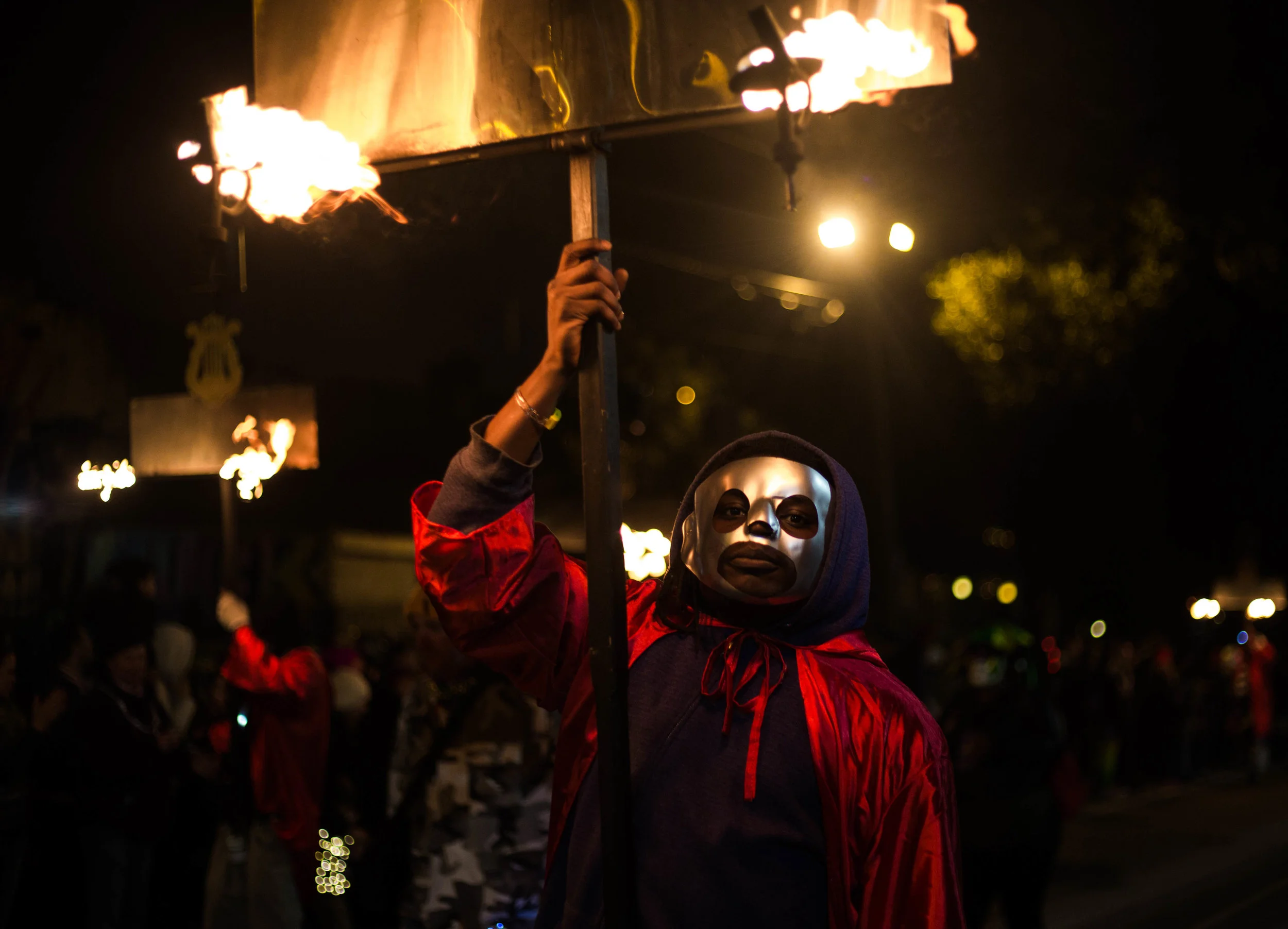 The Flambeaux, the original Mardi Gras lights, were needed for revelers to see the Carnival parades at night. They carried wooden rudimentary torches and lit pine tar rags to light the way.