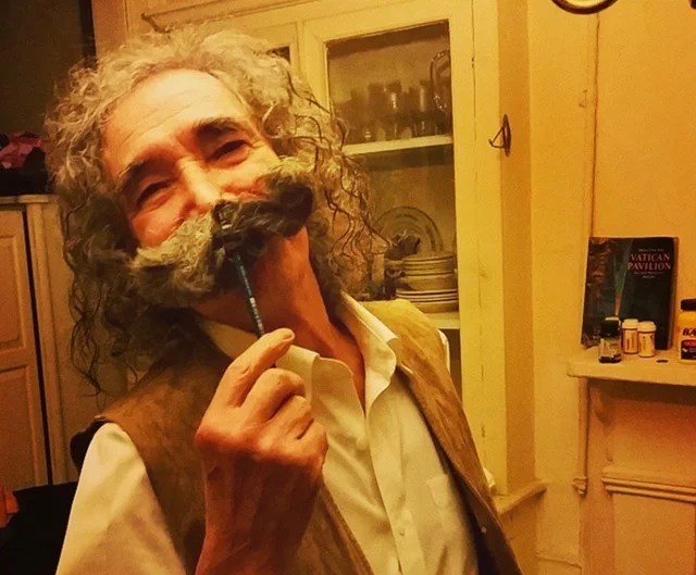 Balzano at home with mustache on his 80th birthday. (John Del Signore)