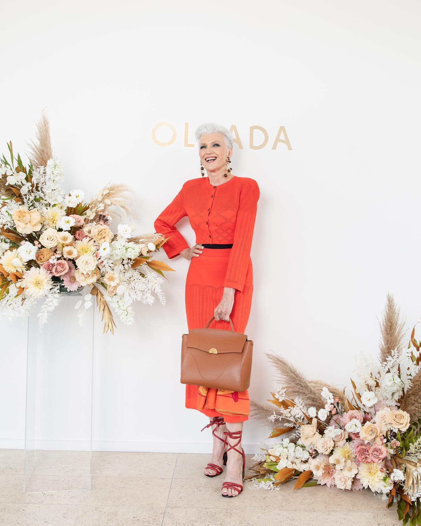 The beautiful @mayemusk leveling up our gorgeous florals from @designsbyahnnyc! @thestandard East Village has 3 different rooms in their Penthouse and we created different spaces in each room to maximize the entire Penthouse. Our photo moment and bar