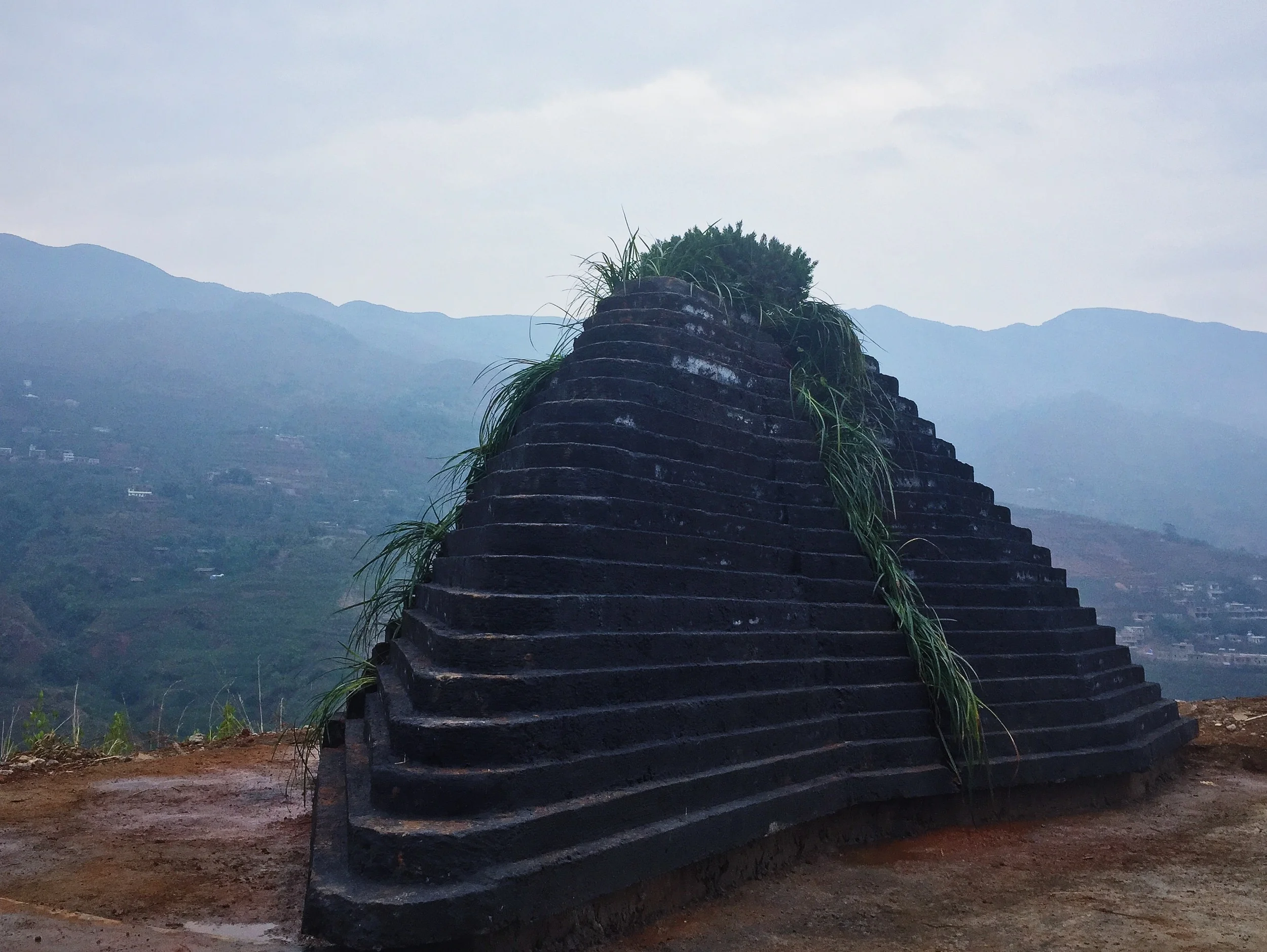   Living Ruins    青山依旧   Year: 2014-2015  Location: Ludian, China  云南鲁甸  Materials: concrete, selected objects, plants  Dimension (LxWxH): 20 x 10 x 8 ft    Facebook public page:  https://www.facebook.com/livingruins/     This public sculpture Living
