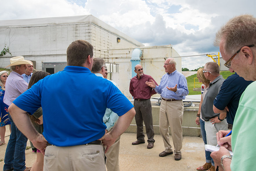 Mark Simmons, Chairman of Simmons Foods, participates in a wastewater tour. Over 600 attendees have toured the facility in the last 15 years.