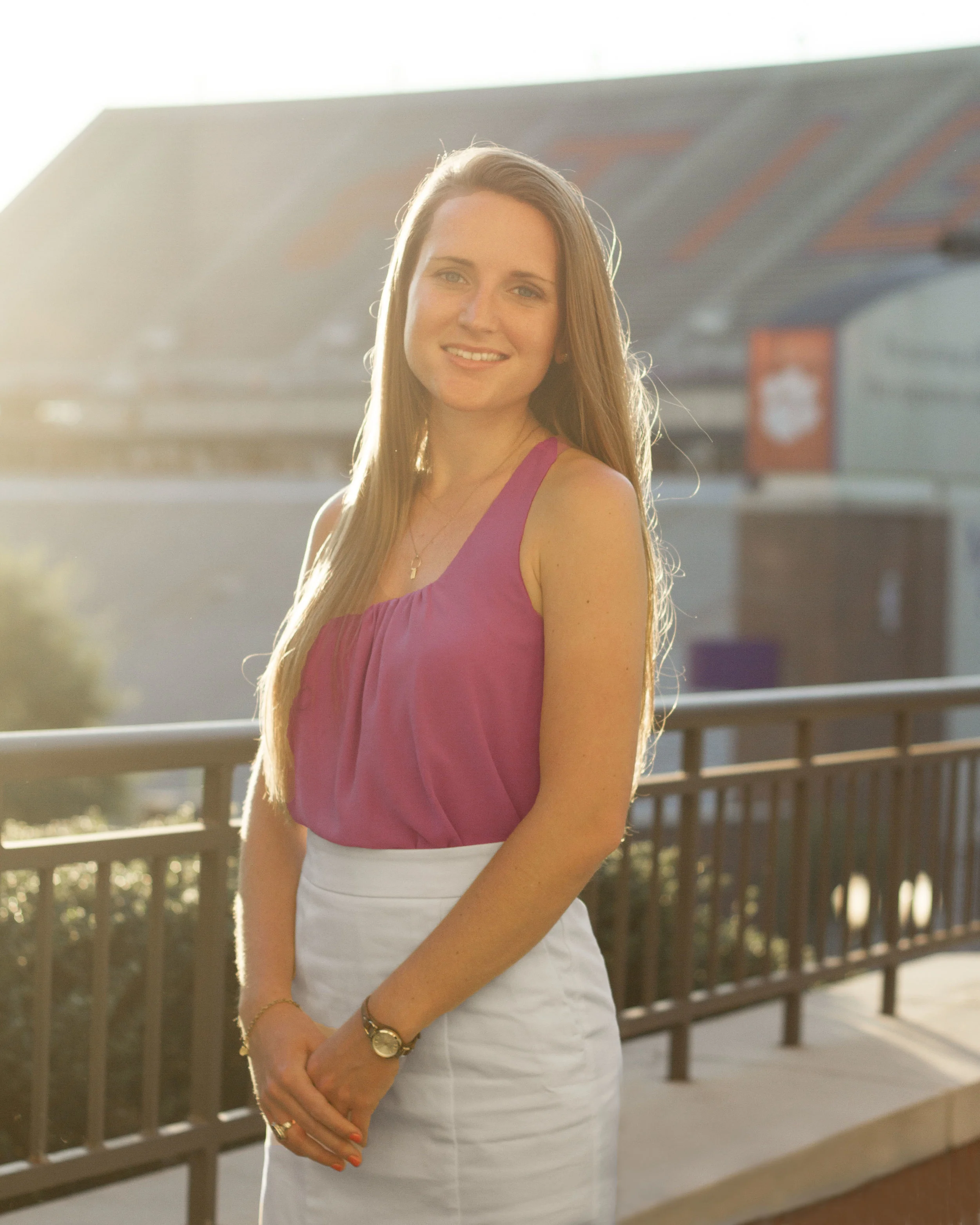 I told Courtney to put her hand on the railing, like I do with all the other seniors. Then we realized that there were chiggers on it, so she put her hands like this. I was happy with how it came out and she didn’t get eaten by chiggers. And I just love the light on her hair!