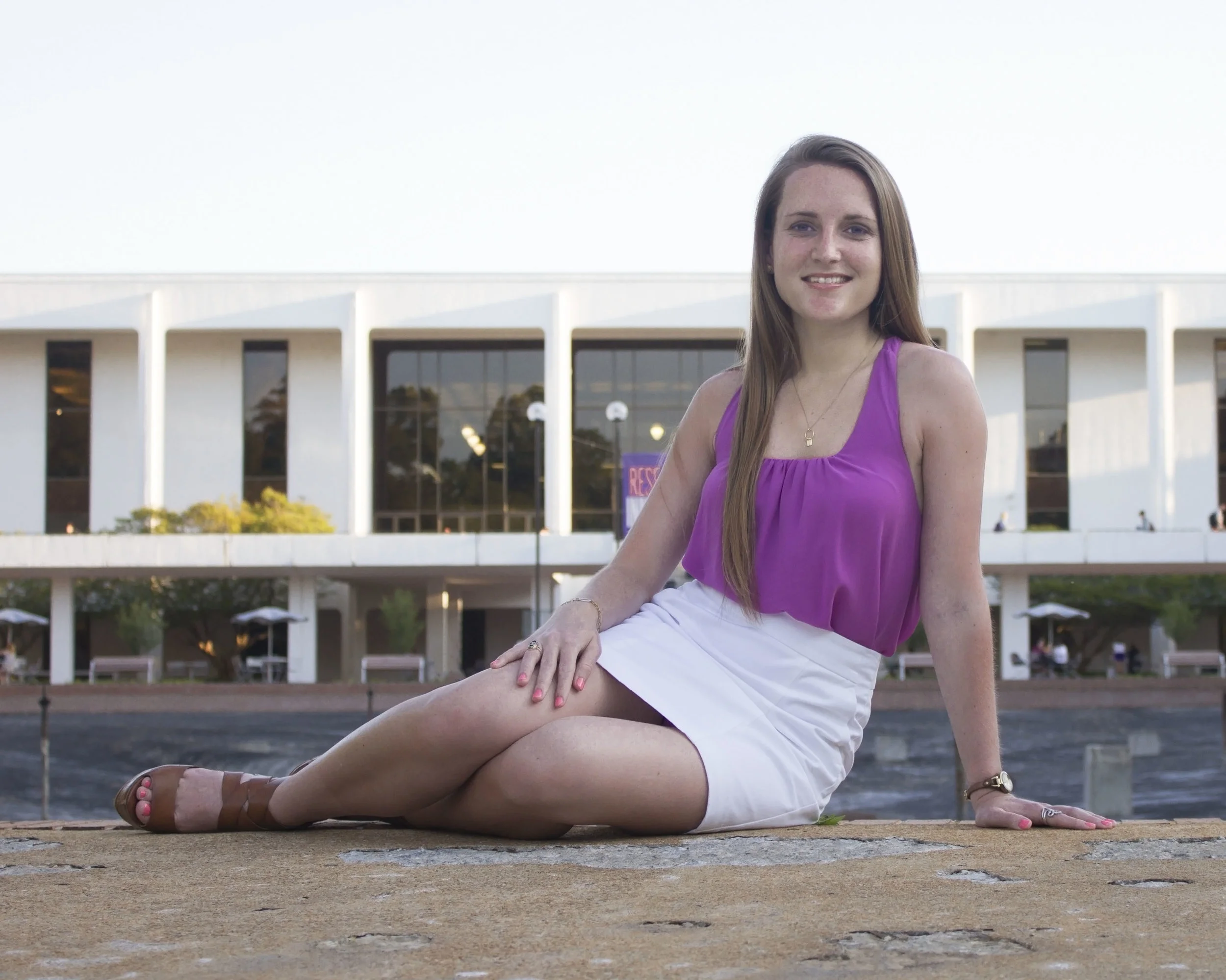 We discovered that the Reflection Pond had been drained, like it is at the beginning of every spring exam week. Since I've already graduated, I don’t really think in terms of semesters anymore, except for when it comes to graduation pictures, so it didn't occur to me that this would happen and I didn't have enough time to figure out how to pretend the background didn't look disgusting.