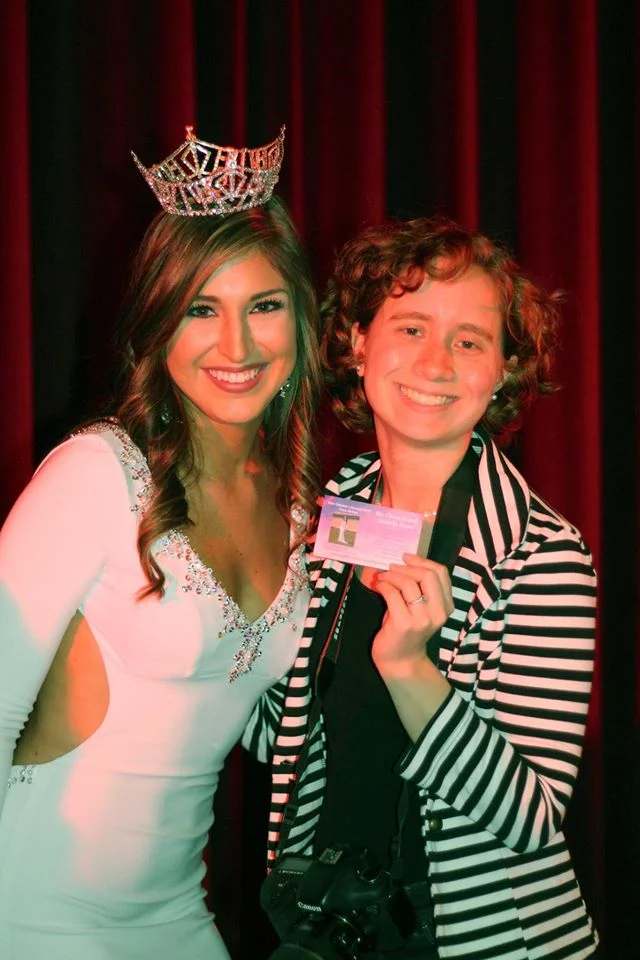 Tracy and I with the ticket that has my photo of her. 