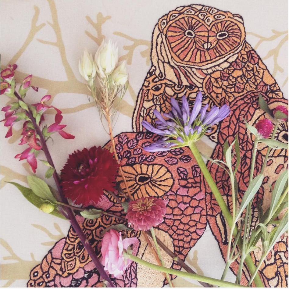 Love cute ottomans and flowers!